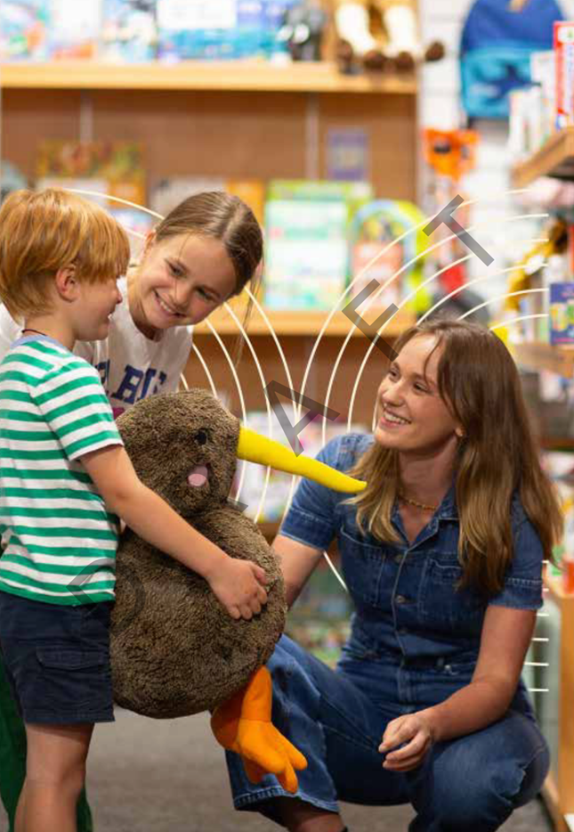A person and two children holding a stuffed animal

Description automatically generated