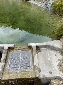 A water flowing into a pond

Description automatically generated with medium confidence