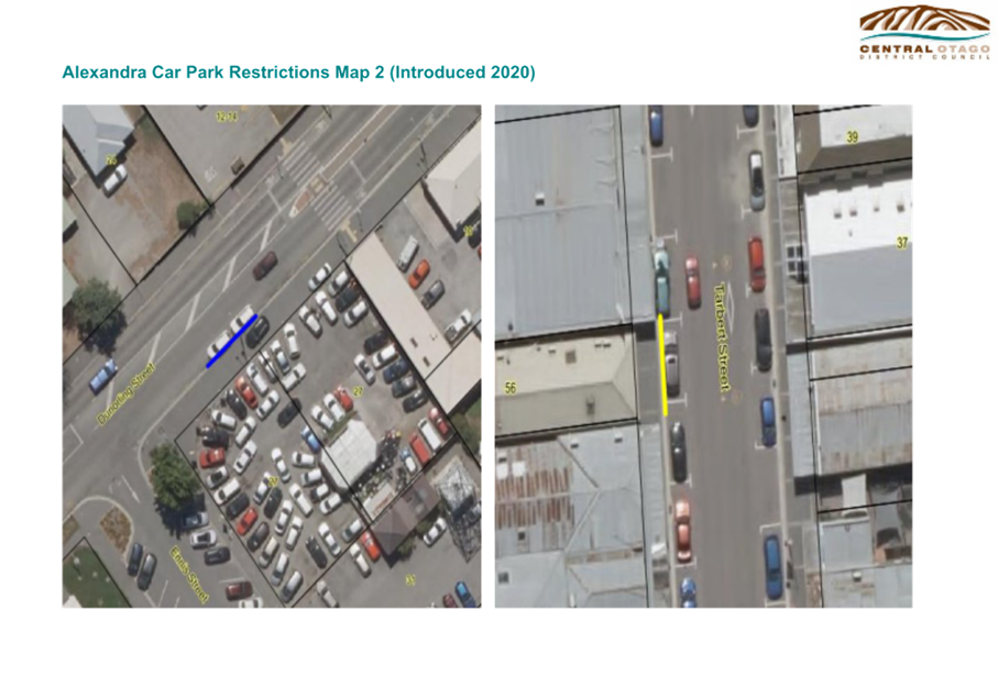 A aerial view of a road and a parking lot

Description automatically generated