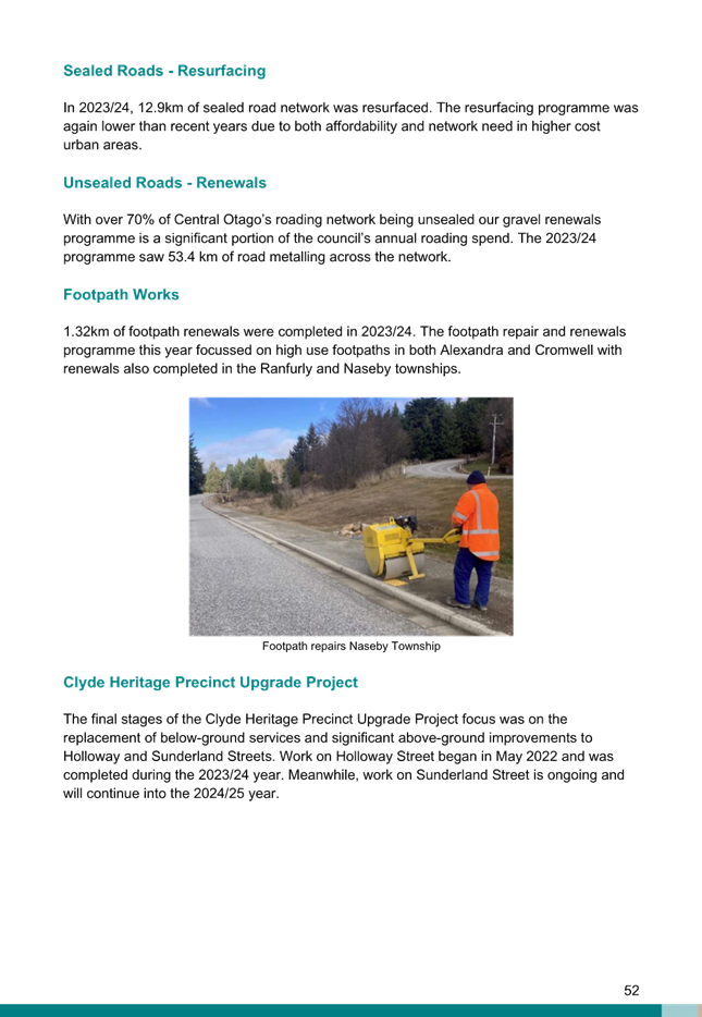 A person in orange vest and yellow vest on a road

Description automatically generated with medium confidence