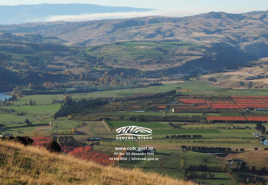 A landscape with hills and fields

Description automatically generated