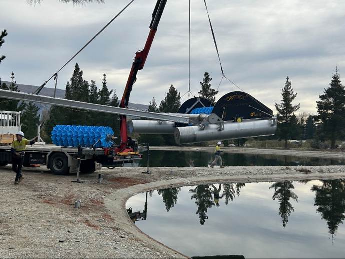 A crane lifting a large metal object

AI-generated content may be incorrect.
